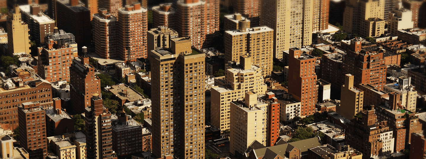 Aerial view of a dense city with large buildings