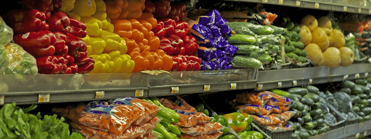 Rows of vegetables at a grocery store