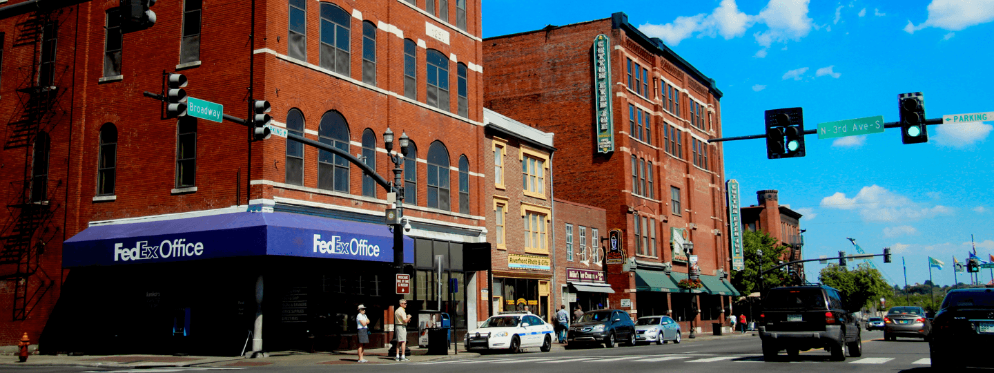 A view of brick buildings and stoplight in Nashville