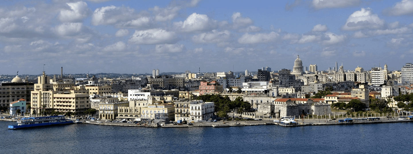 View of a waterway next to a city in Cuba