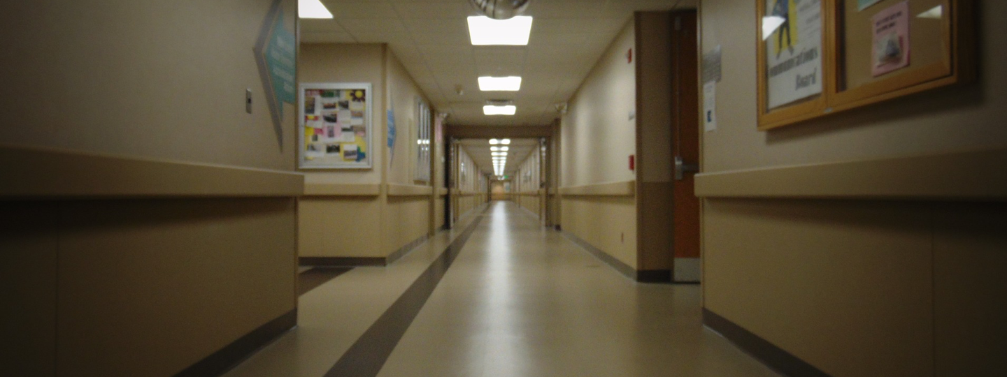 A view down a long hallway at a hospital