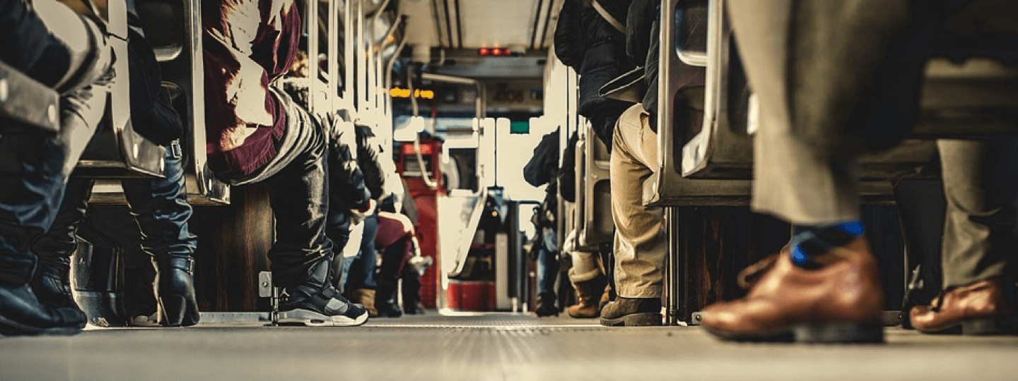 View from the floor of a crowded public bus