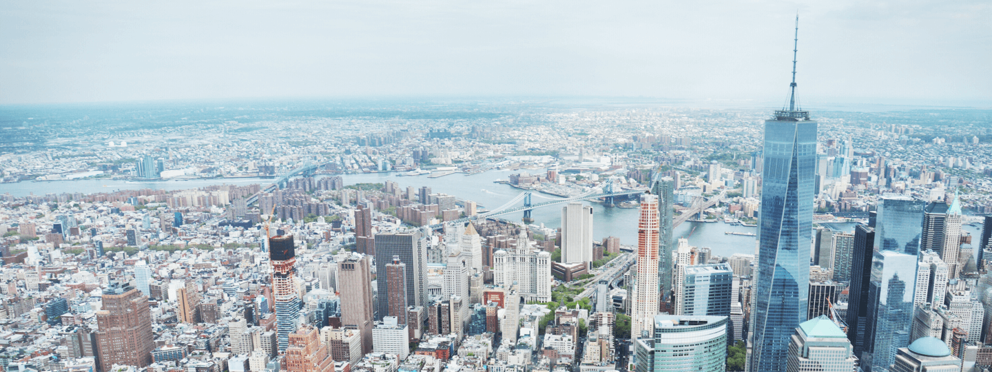 Aerial view of One World Trade Center and New York City