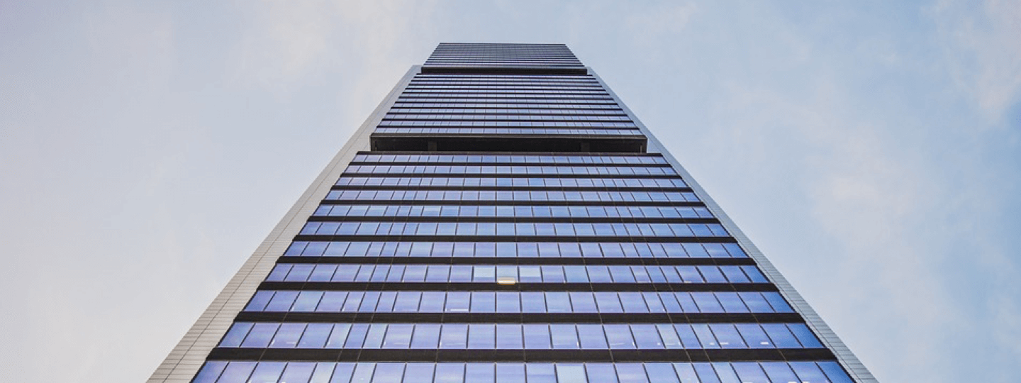 Looking up the side of a very tall office building