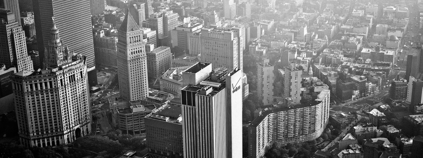 Aerial view of a dense city with large buildings