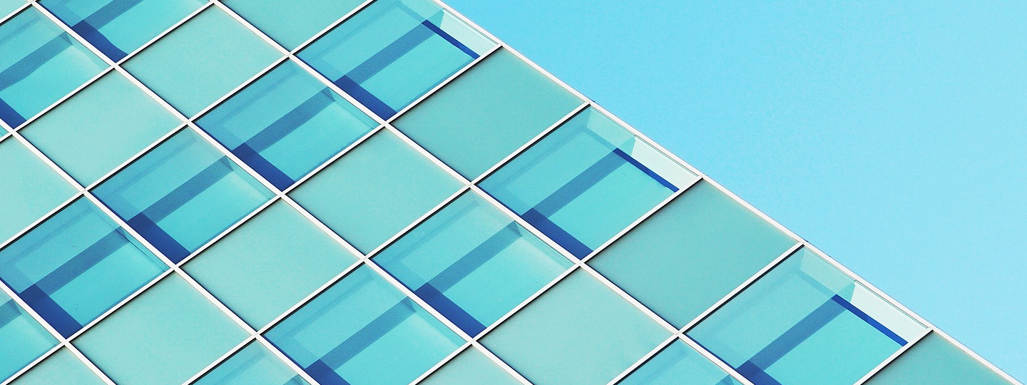 Abstract view of a glass and composite sided office building