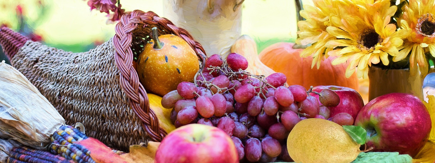 A horn of plenty overflowing with fruits and vegetables