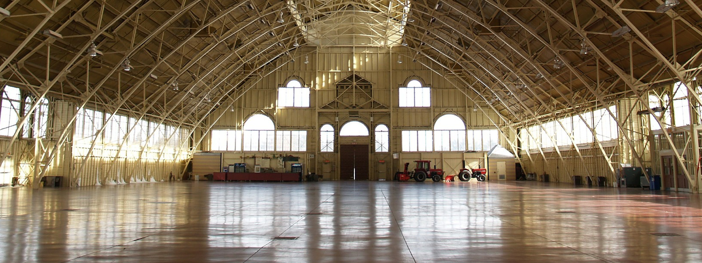 Inside a very large, empty warehouse