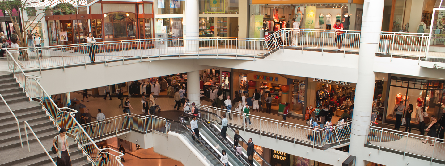 Escalators and stairs within a multi-story mall