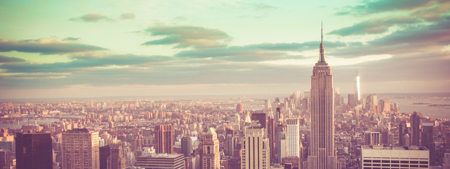 The Empire State Building dominates a view of Manhattan and Brooklyn